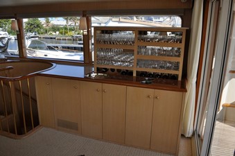 Bar with Retractable Glass Storage