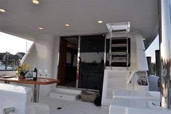 Imagine 3 aft deck forward with wing station  - polished stainless steel door  frame