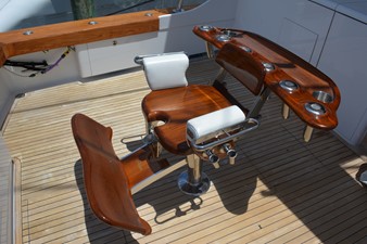Reel Affair 40 Release 130 lb. custom teak chair with rocket launcher