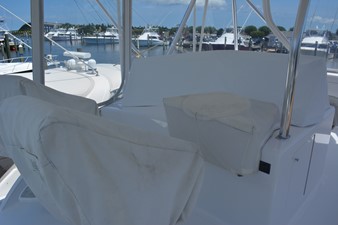 Reel Affair 41 bridge console with teak bubble and electronics box covered