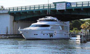 Horizon E78 2 The hydraulic hard top and mast down, going under PGA Bridge
