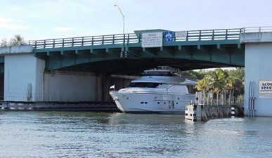 Horizon E78 1 The hydraulic hard top and mast down, going under PGA Bridge