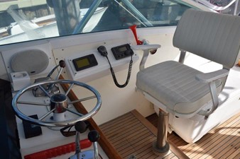 Helm seat, radio and controls