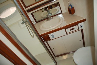Bertram Open Express, Cummins repower - 38 SPECIAL 18 Head vanity and seaparate shower stall