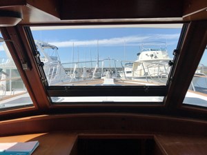 Knotned 19 center opening windshield