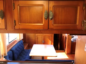 Knotned 28 upper cabinets and pass through to salon dinette