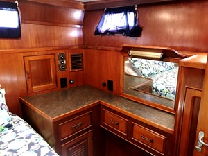 Knotned 49 port aft quarter desk and stowage