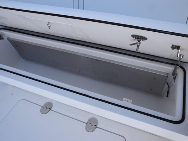   Refrigerated box beneath aft facing seat