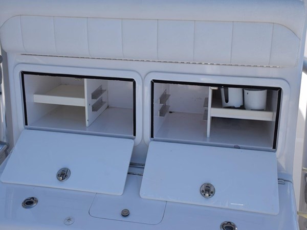   Tackle storage in backrest of rear facing seat