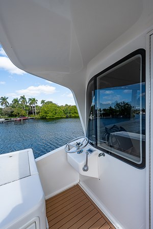 65_ocean_yacht_this_little_piggy_enclosed_flybridge_aft_deck_2