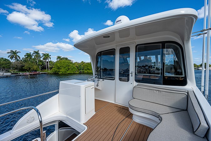 65_ocean_yacht_this_little_piggy_enclosed_flybridge_aft_deck_4