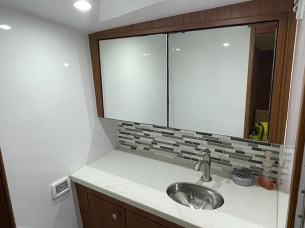 Mirrored Cabinets above Sink Vanity   