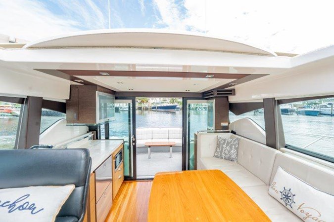 Skylite view of Salon - Dinette Lounge - Galley - Helm