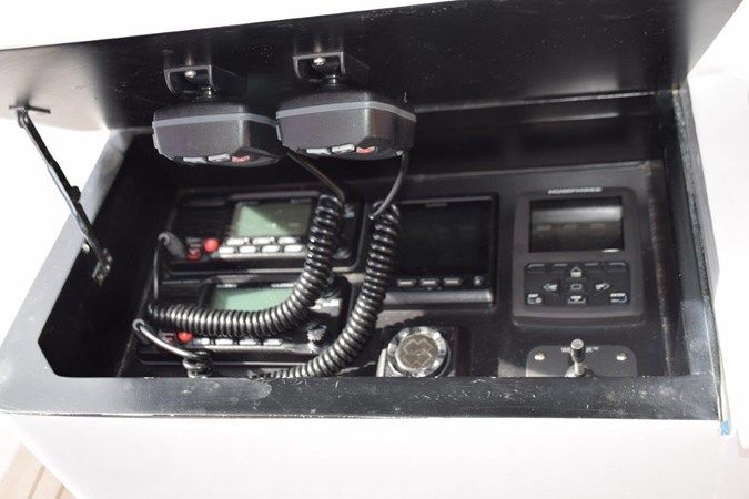 Thruster, auto tabs, autopilot, spotlight, VHF radios  