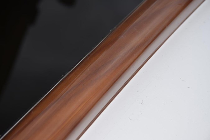 Faux finished toe railing  