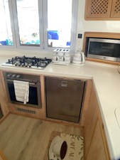 ALESHA D 52 kitchen area with stove/ oven