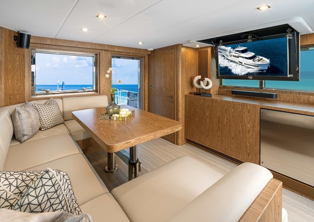 Horizon V68-612 skylounge with u-shaped seating and TV.