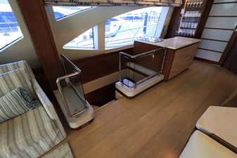 SEA HACK 11 Portside Salon forward view, stairs to master stateroom, bar area forward