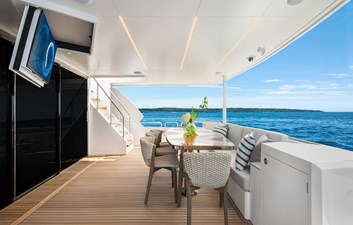 Horizon FD80-617 / AVAILABLE  FLIBS 2025 12 Horizon FD80 Hull 17 aft deck with TV and seating.