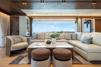 Horizon FD80-617 / AVAILABLE  FLIBS 2025 15 Horizon FD80 Hull 17 salon with sofa and ottomans. 