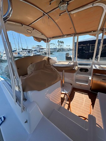 Cover helm station and movable teak table with cover