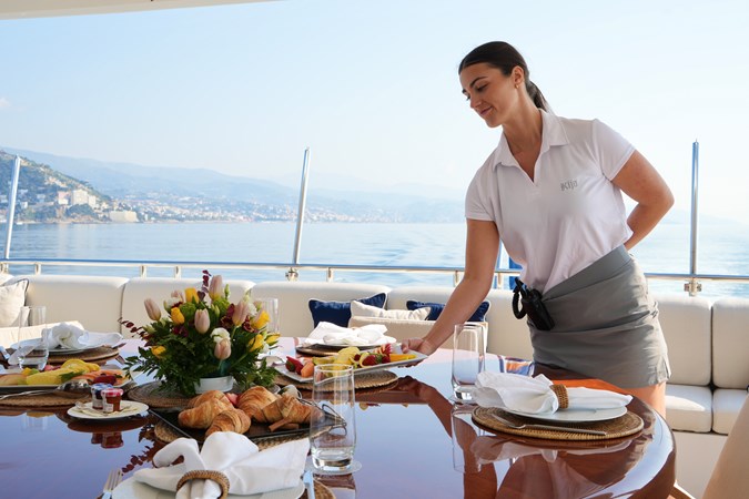 Pampered by your crew, overlooking the bay of ... wherever you want to be
