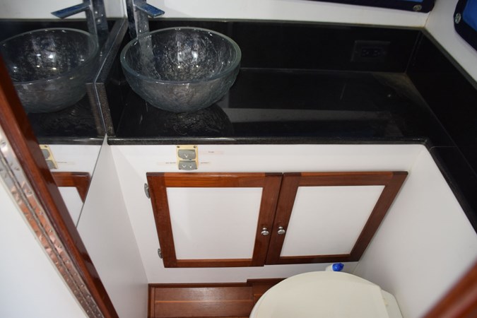 Mirror, teak and holly sole