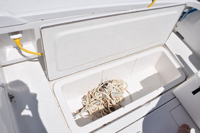 Starboard underdeck box with stern anchor