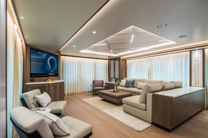 Horizon FD90 Hull 34 aft facing salon with custom ceiling feature and lighting.