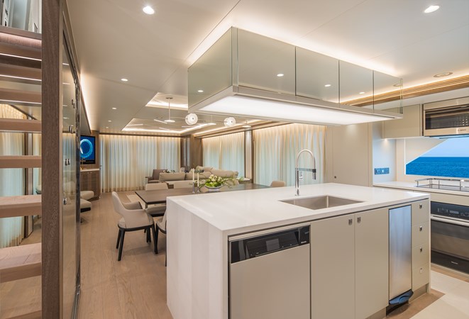 Horizon FD90 Hull 34 open galley with island countertops. 