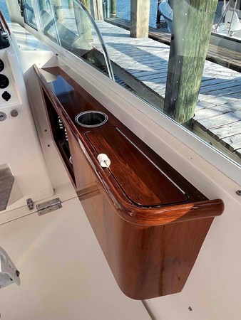 LUNA, 2013 Hunt Yachts Harrier 36: Helm Teak Console w Cubby