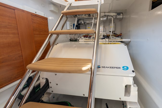 Midships Upper Salon Storage Compartment with Seakeeper