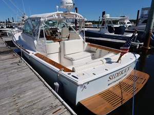 SIDEKICK 4 SIDEKICK, 2007 Hunt Yachts Surfhunter 29: Port Quarter at The Dock