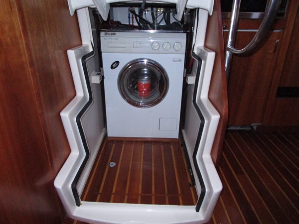 Washer and dryer under steps