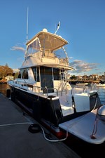 UNNAMED 4 DEFY GRAVITY, 2018 Sabre 48 Flybridge Sedan, Port Quarter at Dock