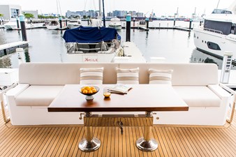 70' Johnson Skylounge 2026 30 Aft deck table