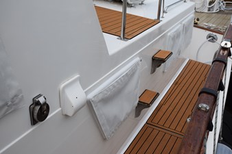 JAMIE LYN 4 1997 Grand Banks Classic yacht deck with teak steps and railings.