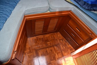 JAMIE LYN 28 1997 Grand Banks Classic interior with wooden cabinetry and parquet flooring.