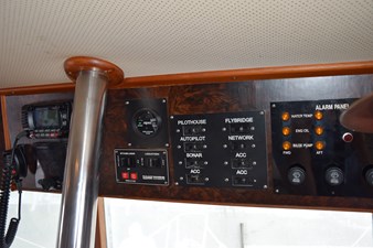 JAMIE LYN 47 Control panel of a 1997 Grand Banks Classic boat with various switches and indicators.