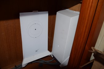 JAMIE LYN 54 Wi-Fi router setup inside a 1997 Grand Banks Classic boat cabinet.