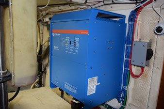 JAMIE LYN 92 Blue electrical inverter installed on a 1997 Grand Banks Classic boat.