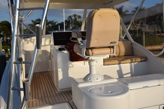 OSPREY 3 Teak decking on bridge deck and aft facing bench seat to right of helm. - Copy