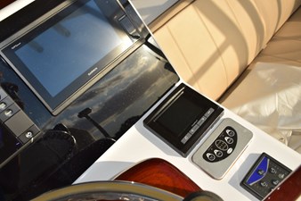 OSPREY 28 Garmin display, Cummins smartcraft digital engine display, Glendinning electric engine control selector panel and trim tabs controller