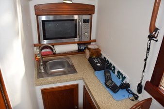 OSPREY 33 Galley area to starboard, Corian countertop, stainless steel sink