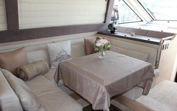 Monte Carlo 5 10 Interior view of salon on Monte Carlo, featuring comfortable seating area and a table