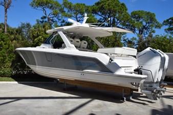 DIAMOND PEARL  1 2024 Tiara Yachts 38 LS rack stored with Makefast electric shade deployed.