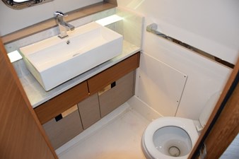 DIAMOND PEARL  20 Nicely finished bathroom with door and freshwater toilet