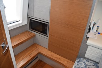 DIAMOND PEARL  21 Wood cabin entry steps and sole. Microwave Oven - electrical panel behind door