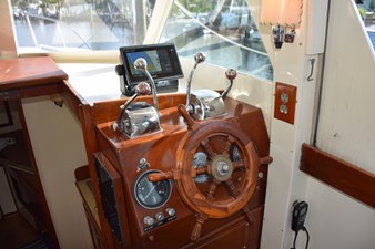 EAGLES NEST  9 Teak cutter helm wheel at lower station