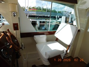 EAGLES NEST  11 Starboard salon with Ladderback helm Chair at lower helm